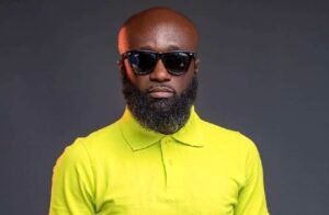 Ghanaian Personality KOKA Calls for FBI Probe into Chris Waddle's Wealth 1