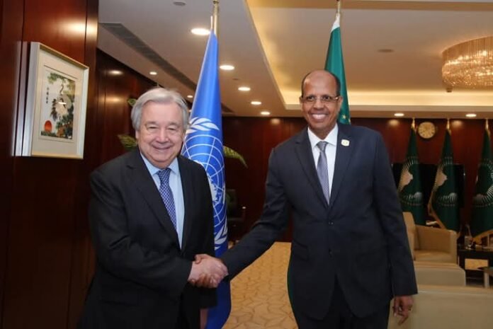 António Guterres (left) and Mahmoud Ali Youssouf (right)
