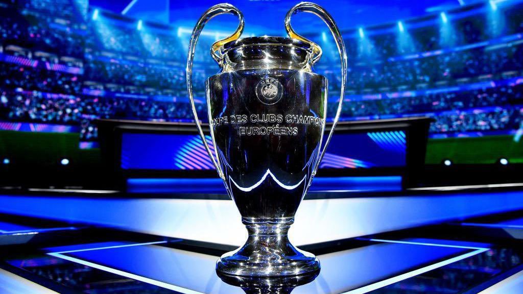 a silver trophy on a stage