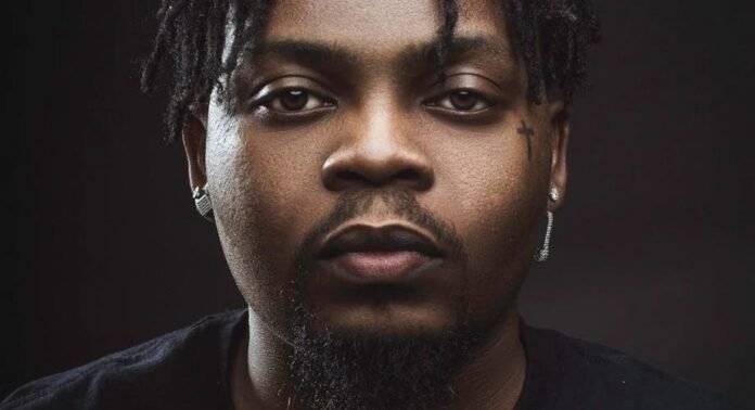 Olamide Addresses Heated Fan Debate: Greatness Isn’t Minimized by Opinions or Labels