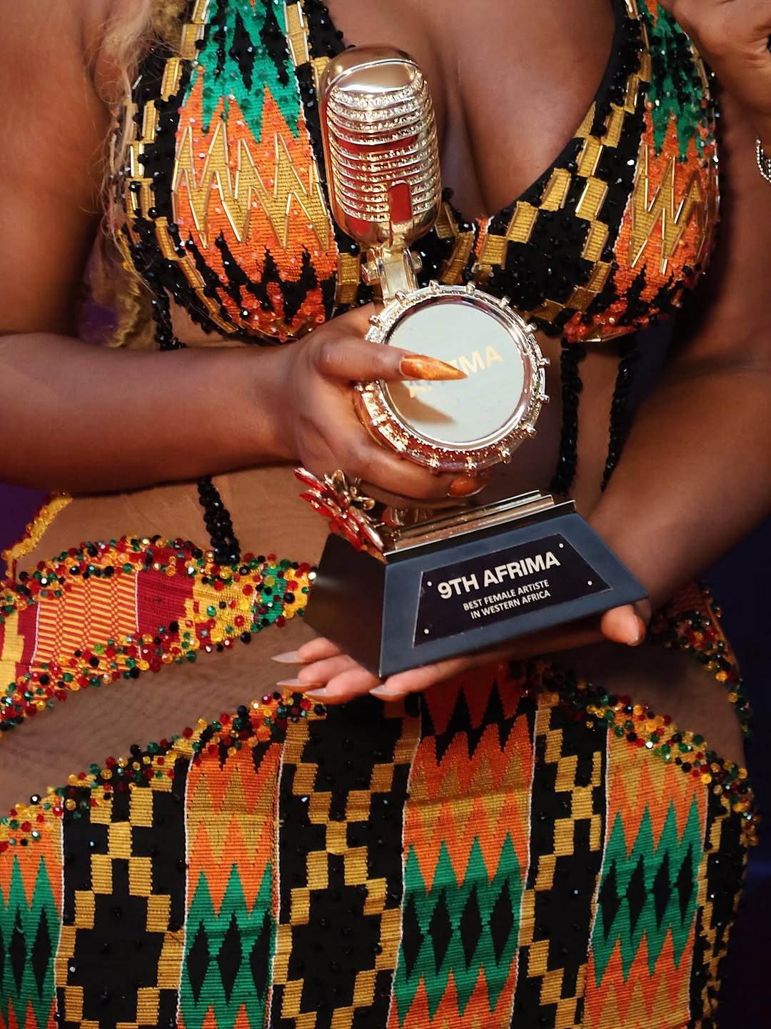 Wendy Shay displays her AFRIMA award Wendy Shay displays her AFRIMA award
