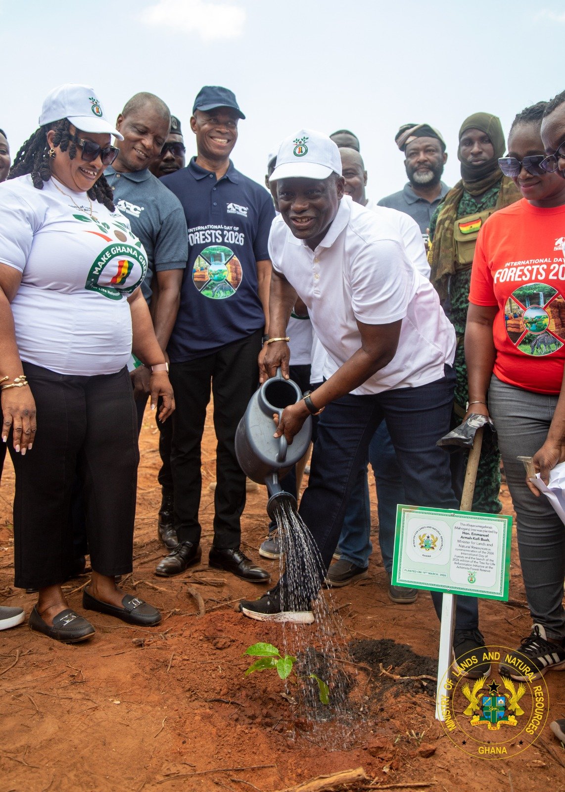 Hon. Emmanuel Armah-Kofi Buah planting a tree 