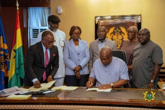 John Dramani Mahama signing five bills into law