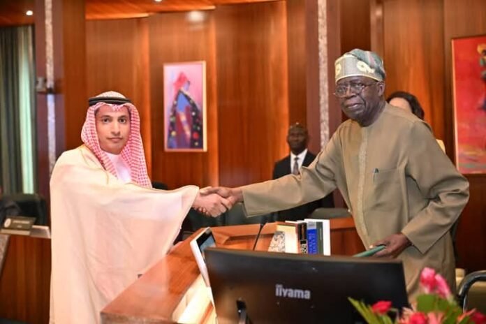 Bola Ahmed Tinubu receiving a letter of credence from one of the envoys