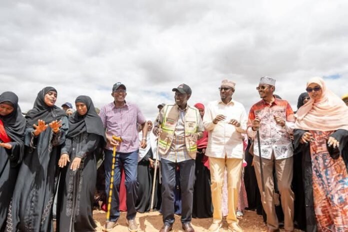 President William Ruto (4th right) kicking off one of the projects in Wajir County