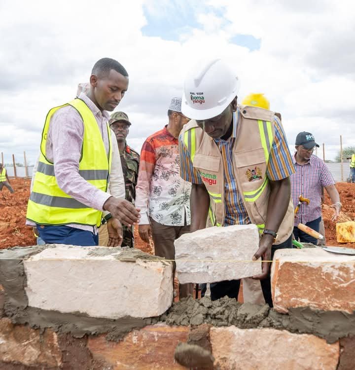 William Ruto laying foundation block for a development project in Wajir County