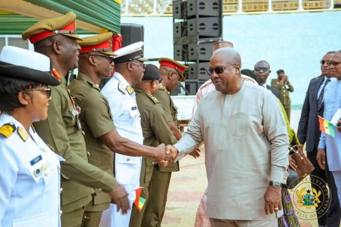 John Dramani Mahama exchanging pleasantries with security personnel at the parade