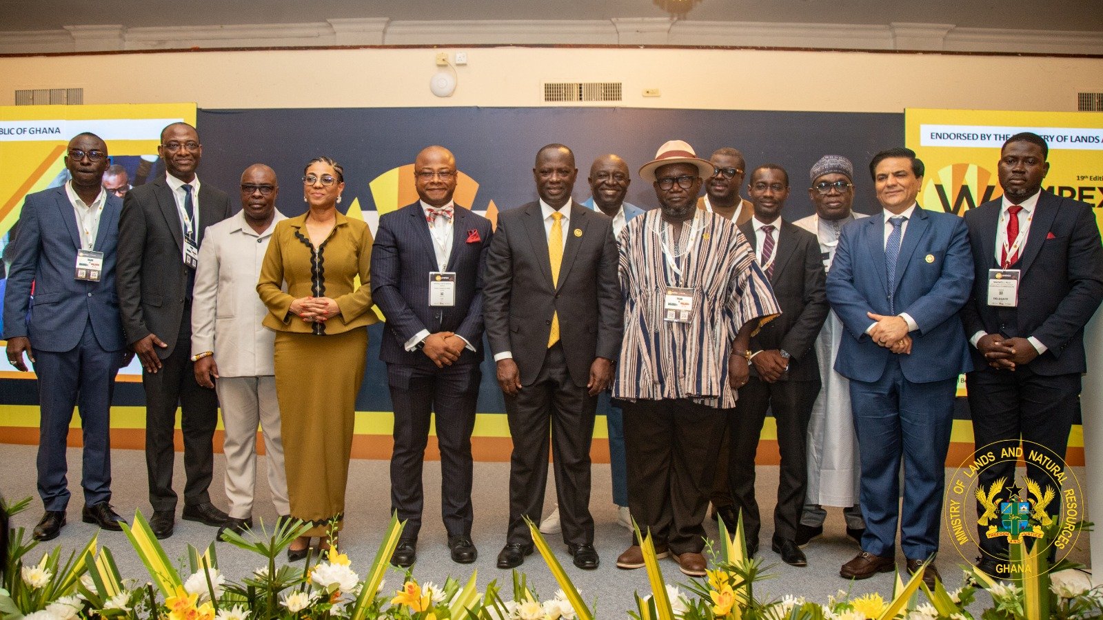 Dignitaries pose for a photograph at WAMPEX 2026