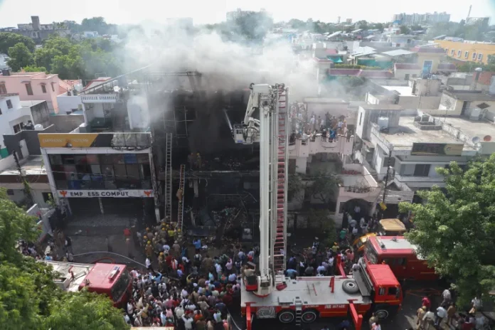 The building engulfed by fire in Lucknow The building engulfed by fire in Lucknow