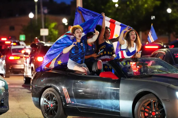 Cape Verde fans celebrating after their World Cup round of 32 qualification 