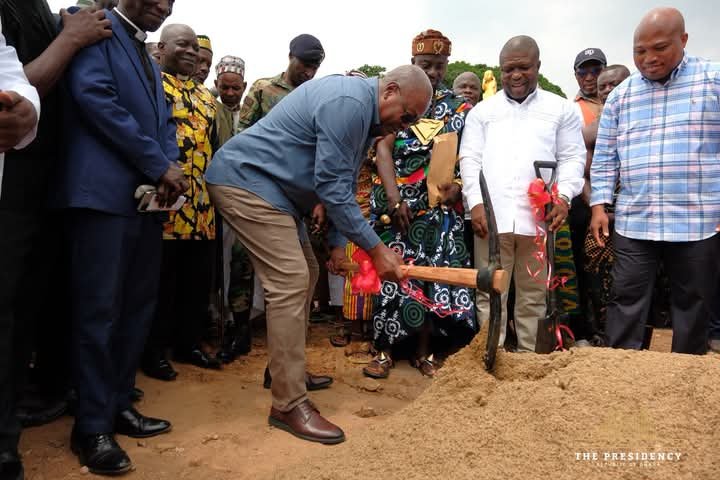 John Dramani Mahama digging ground to mark the start of the construction of a 24-Hour Economy Model Market in Juapong, North Tongu District