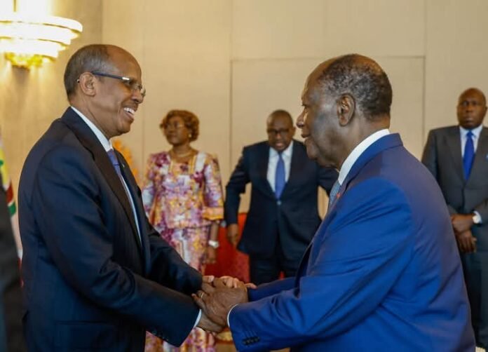 Mahmoud Ali Youssouf (left) and Alassane Ouattara